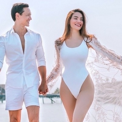 Thời trang đi biển đồng điệu của Hồ Ngọc Hà - Kim Lý